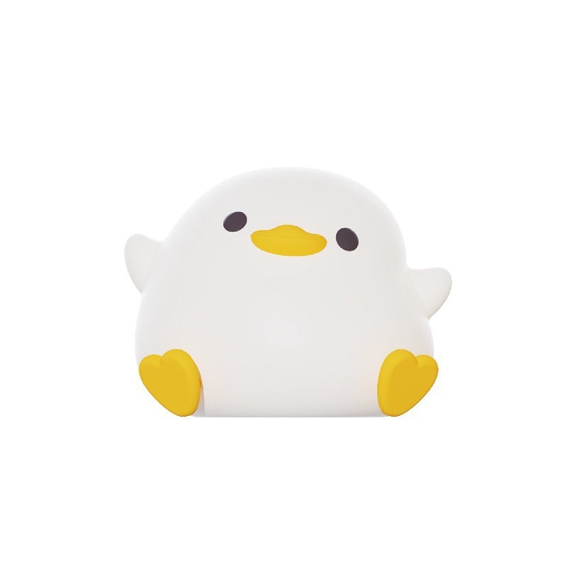 Squishy Sleep Companion: Doudou Duck Silicone Night Lamp with $\mathbf{20}$-Minute Timer & USB Charging.