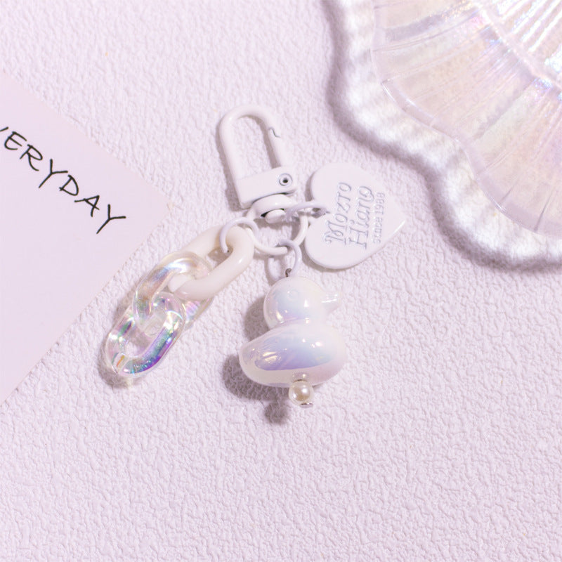 Pocket Charm: Colorful Cartoon Duck Resin Keychain Ornament.