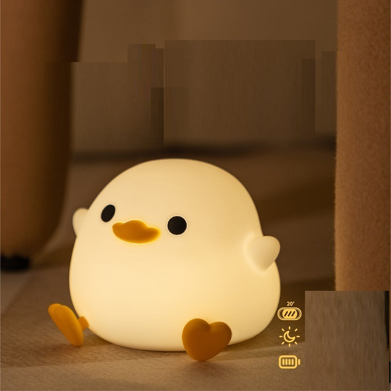 Squishy Sleep Companion: Doudou Duck Silicone Night Lamp with $\mathbf{20}$-Minute Timer & USB Charging.