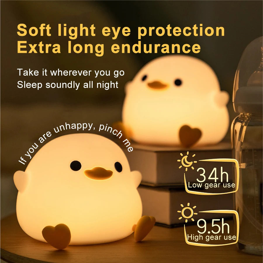 Squishy Sleep Companion: Doudou Duck Silicone Night Lamp with $\mathbf{20}$-Minute Timer & USB Charging.