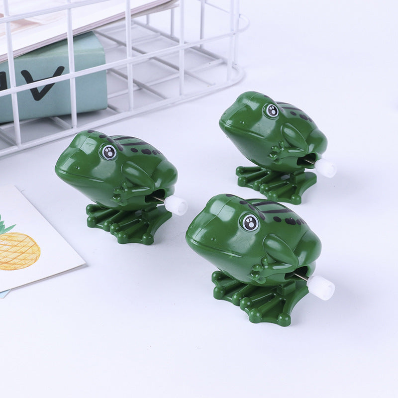 Leap Into Learning: Plastic Frog Jumping Clockwork Educational Toy ($\mathbf{8 \times 5\text{cm}}$).