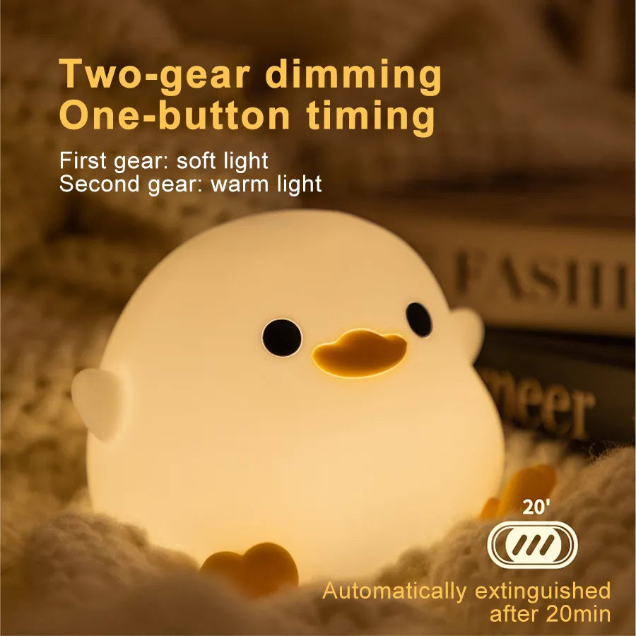 Squishy Sleep Companion: Doudou Duck Silicone Night Lamp with $\mathbf{20}$-Minute Timer & USB Charging.