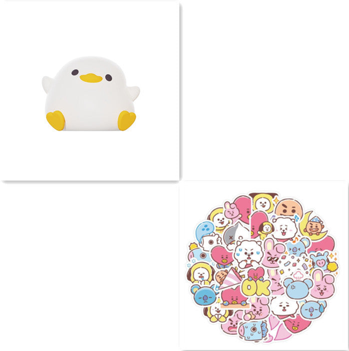 Squishy Sleep Companion: Doudou Duck Silicone Night Lamp with $\mathbf{20}$-Minute Timer & USB Charging.