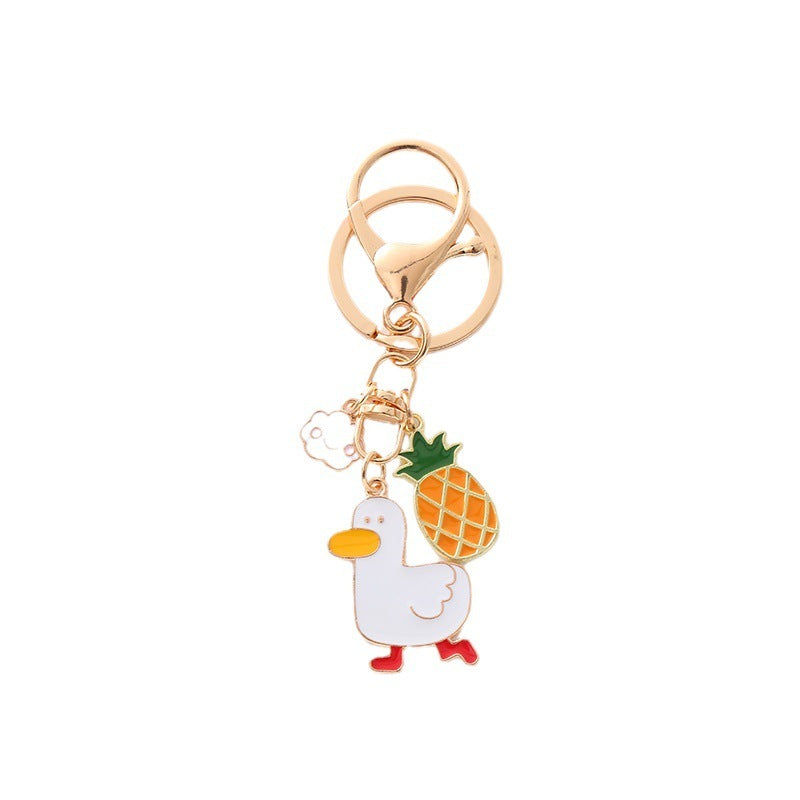 Quirky Charm: Pineapple Fried Egg Duck Metal Car Key Ring ($\mathbf{5.9\text{g}}$).