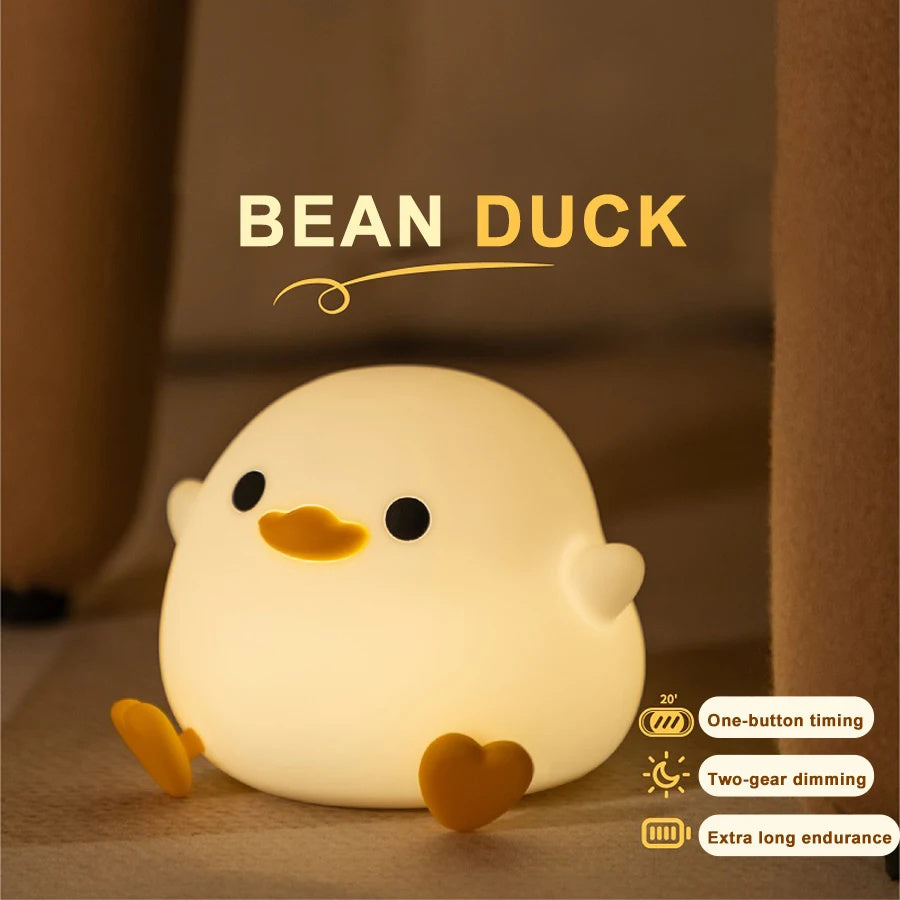 Squishy Sleep Companion: Doudou Duck Silicone Night Lamp with $\mathbf{20}$-Minute Timer & USB Charging.