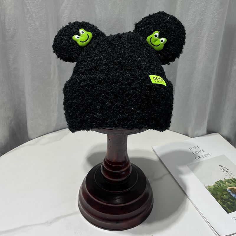 Cozy Fun: Japanese Cartoon Cute Frog Lambswool Bun Head Hat (Warm & Age-Defying).