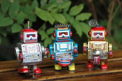 Nostalgic Fun: Children's Wind-up Tin Metal Leap Frog Toy and Collectibles ($\mathbf{7-14}$ Years).