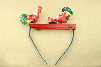 Nostalgic Fun: Children's Wind-up Tin Metal Leap Frog Toy and Collectibles ($\mathbf{7-14}$ Years).