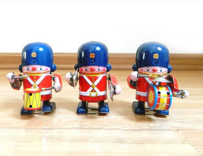 Nostalgic Fun: Children's Wind-up Tin Metal Leap Frog Toy and Collectibles ($\mathbf{7-14}$ Years).