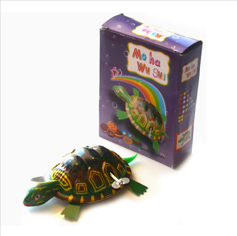 Nostalgic Fun: Children's Wind-up Tin Metal Leap Frog Toy and Collectibles ($\mathbf{7-14}$ Years).