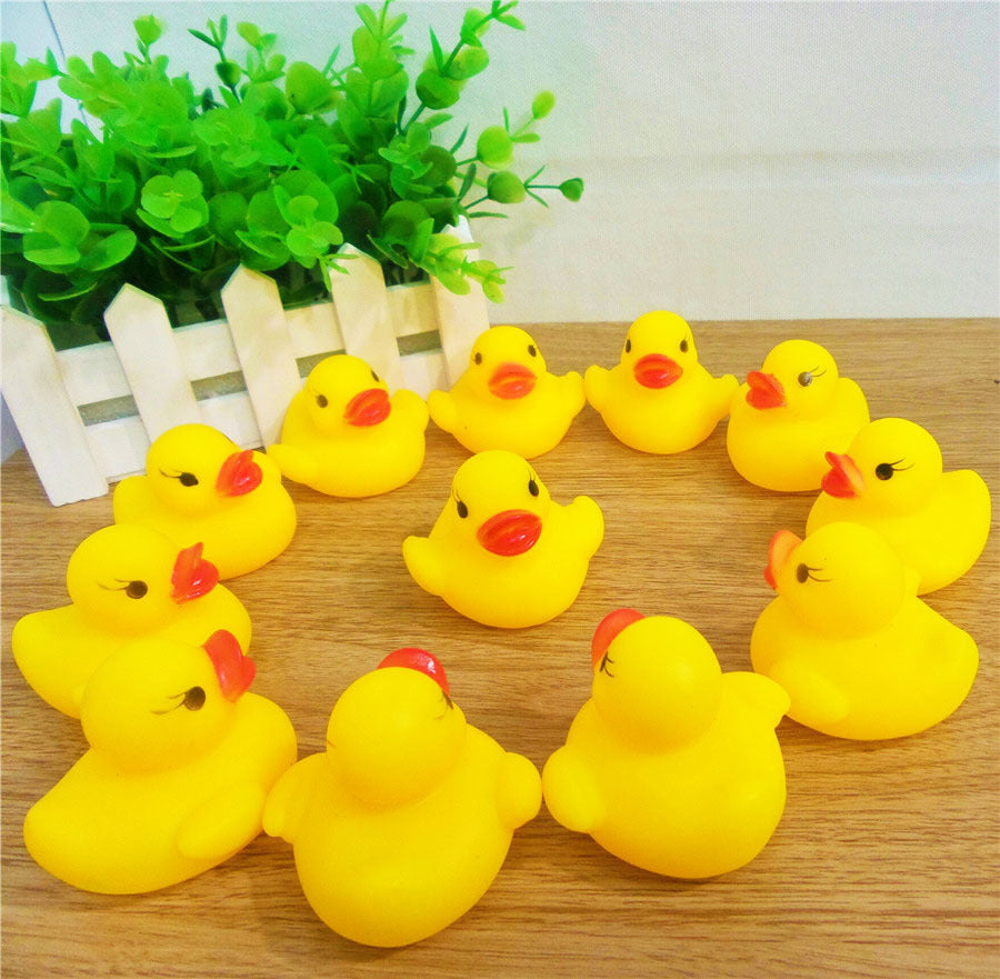 Splish Splash Fun: Little Yellow Duck Voice Squeeze Toy for Baby Bath Time.