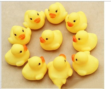 Splish Splash Fun: Little Yellow Duck Voice Squeeze Toy for Baby Bath Time.