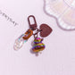 Pocket Charm: Colorful Cartoon Duck Resin Keychain Ornament.