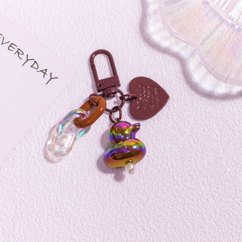 Pocket Charm: Colorful Cartoon Duck Resin Keychain Ornament.