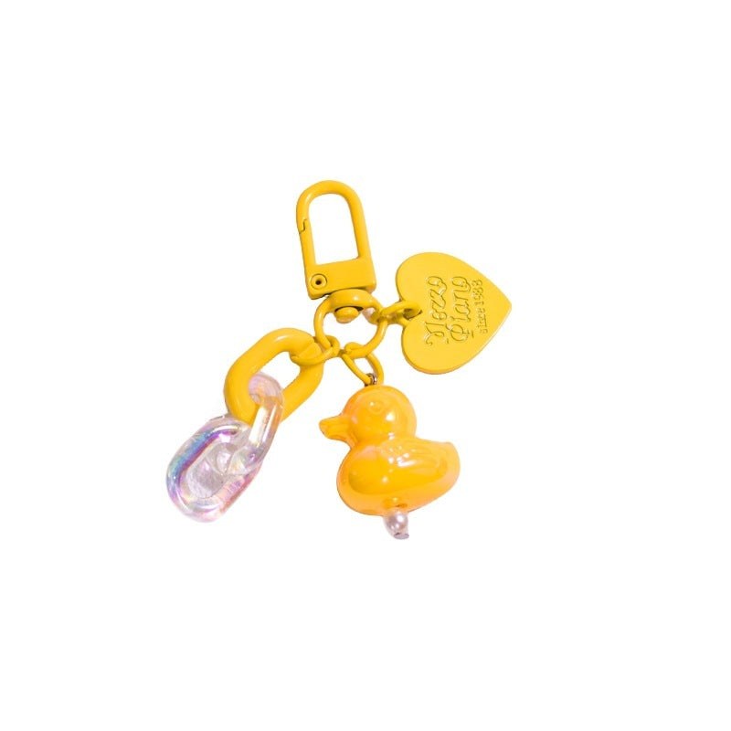 Pocket Charm: Colorful Cartoon Duck Resin Keychain Ornament.