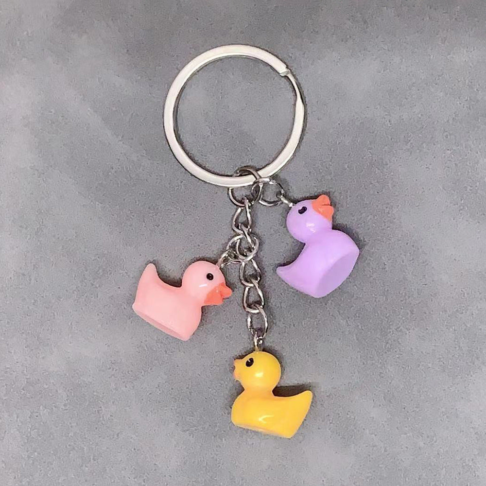 Charming & Simple: Resin Small Yellow Duck Keychain Pendant (Multi-Color Options).