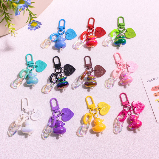 Pocket Charm: Colorful Cartoon Duck Resin Keychain Ornament.