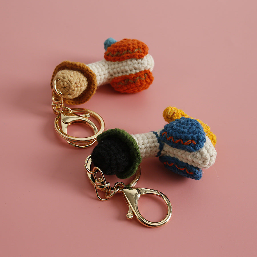 Cozy Companion: Hand-Woven Forward Duck Little Doll Keychain (Wool, Cartoon Style).