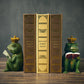 Studious Companions: Cute Frog Book Leaning Desktop Ornaments (Resin).