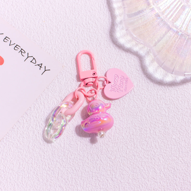 Pocket Charm: Colorful Cartoon Duck Resin Keychain Ornament.
