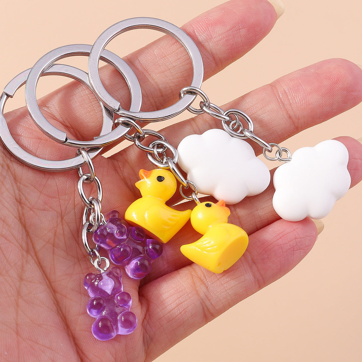Sky High Style: Cartoon Little Yellow Duck & Cloud Keychain Accessory (Zinc Alloy).