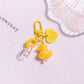 Pocket Charm: Colorful Cartoon Duck Resin Keychain Ornament.