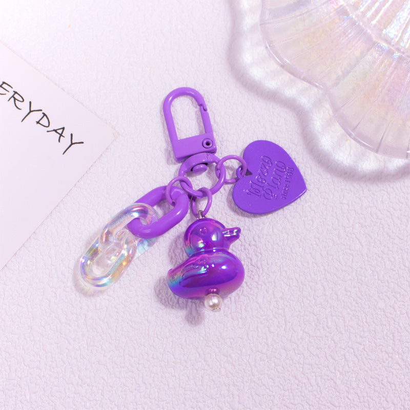 Pocket Charm: Colorful Cartoon Duck Resin Keychain Ornament.