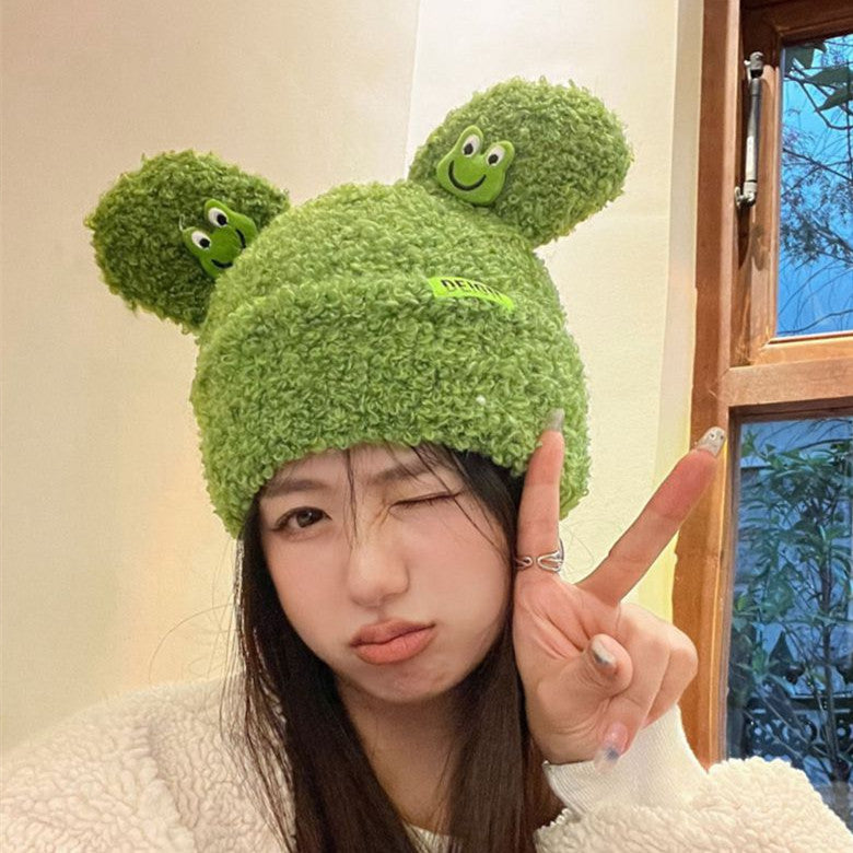 Cozy Fun: Japanese Cartoon Cute Frog Lambswool Bun Head Hat (Warm & Age-Defying).