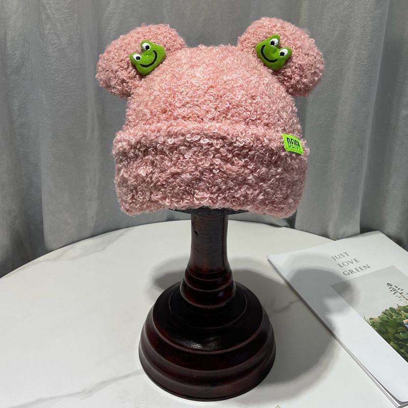 Cozy Fun: Japanese Cartoon Cute Frog Lambswool Bun Head Hat (Warm & Age-Defying).