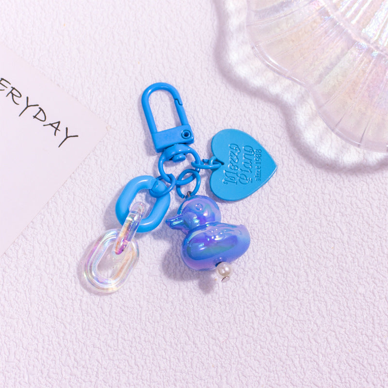 Pocket Charm: Colorful Cartoon Duck Resin Keychain Ornament.
