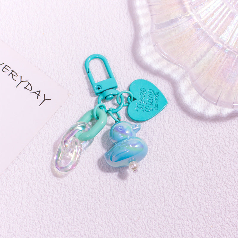 Pocket Charm: Colorful Cartoon Duck Resin Keychain Ornament.