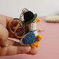 Cozy Companion: Hand-Woven Forward Duck Little Doll Keychain (Wool, Cartoon Style).