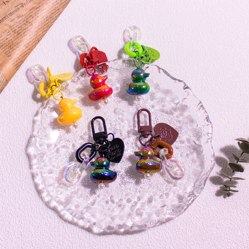 Pocket Charm: Colorful Cartoon Duck Resin Keychain Ornament.