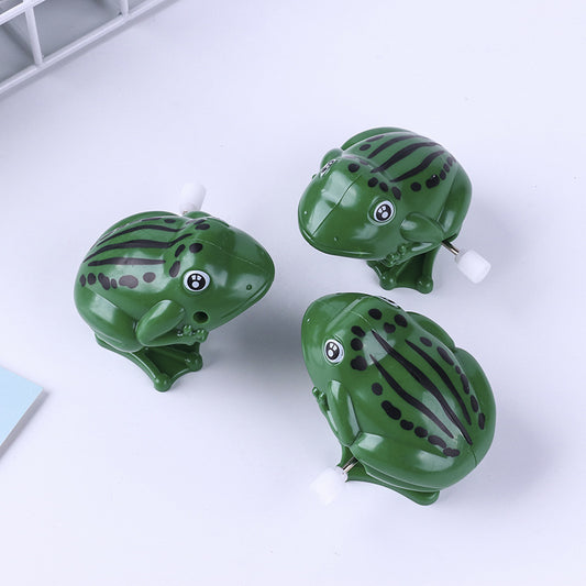 Leap Into Learning: Plastic Frog Jumping Clockwork Educational Toy ($\mathbf{8 \times 5\text{cm}}$).