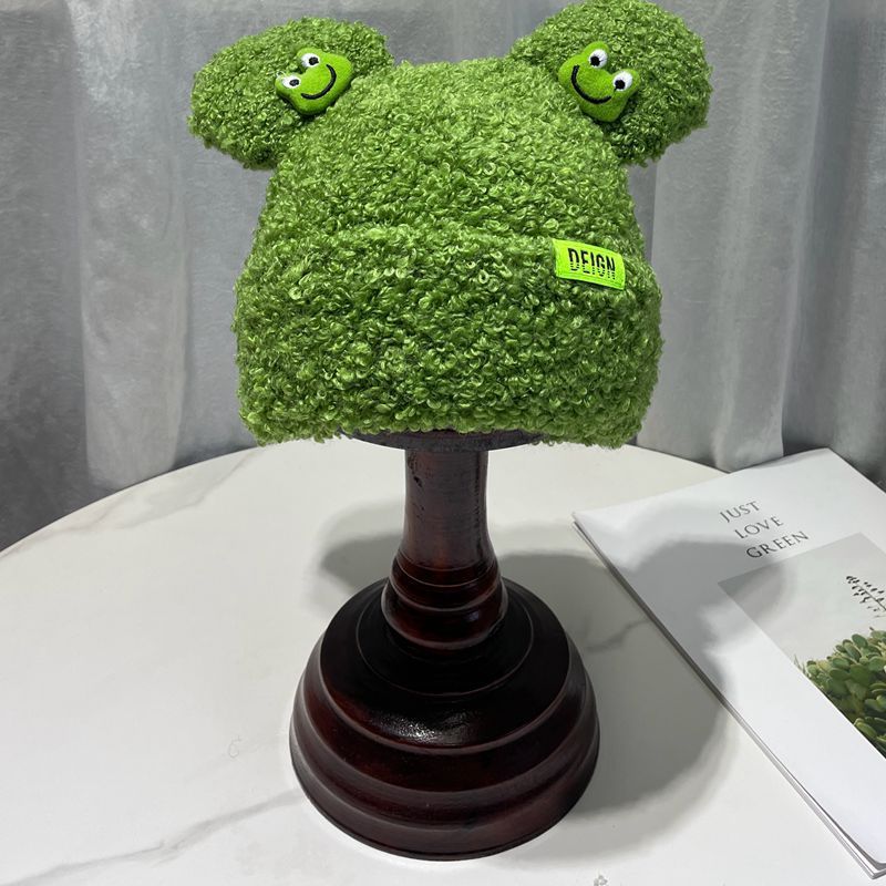 Cozy Fun: Japanese Cartoon Cute Frog Lambswool Bun Head Hat (Warm & Age-Defying).