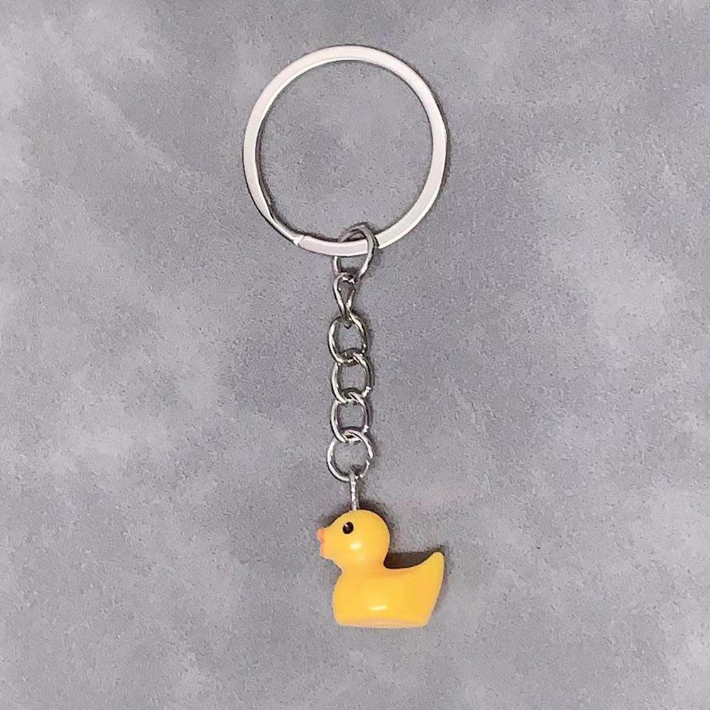 Charming & Simple: Resin Small Yellow Duck Keychain Pendant (Multi-Color Options).