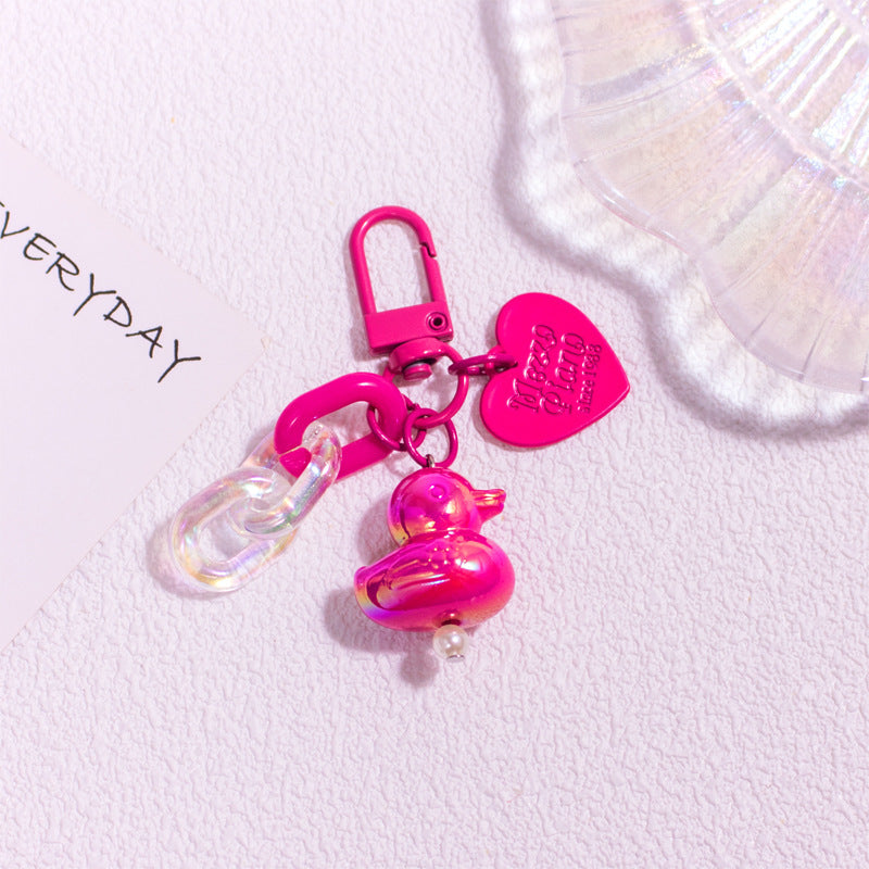 Pocket Charm: Colorful Cartoon Duck Resin Keychain Ornament.