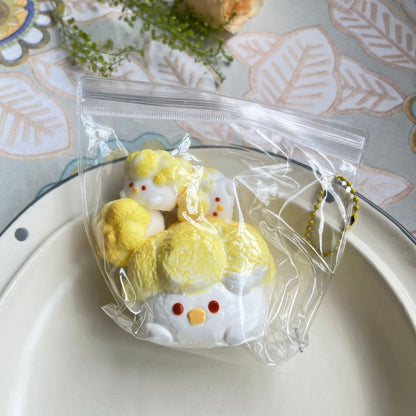 Satisfying Squish: Popcorn Chicken Slow Rebound Squeezing Toy Set (One Large, Three Small, Edible Silicone).