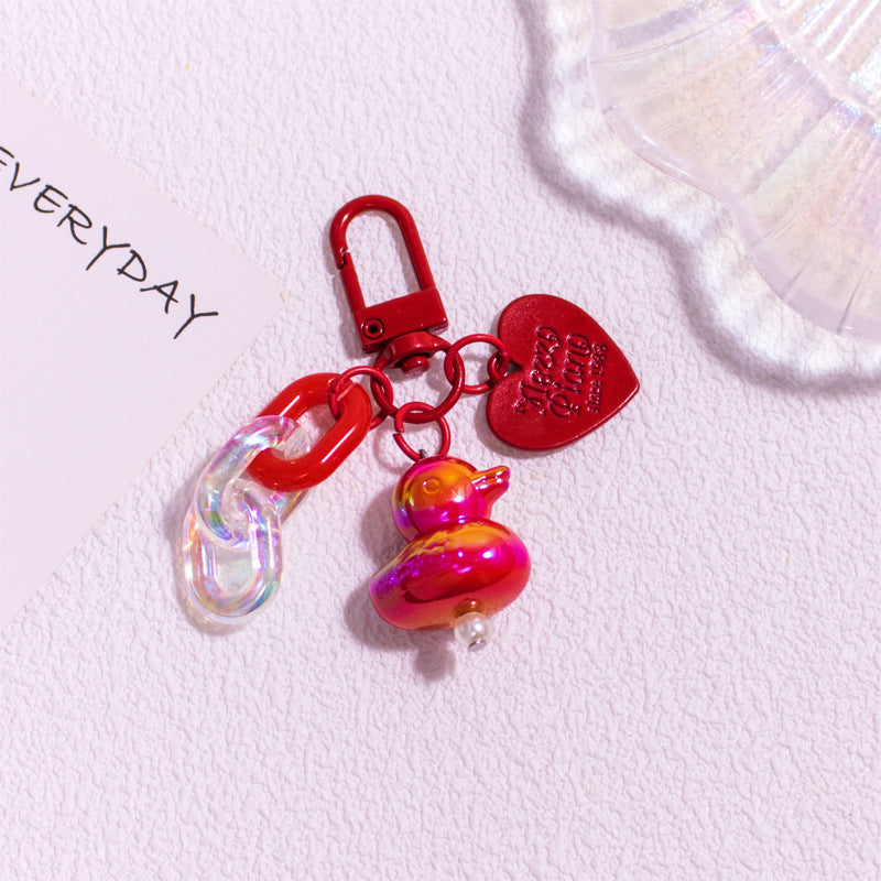 Pocket Charm: Colorful Cartoon Duck Resin Keychain Ornament.